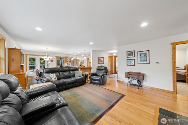 39800 224th Ave SE, Enumclaw, WA 98022 - living room with wood finished floors, a chandelier, and recessed lighting