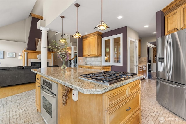 kitchen featuring appliances with stainless steel finishes, recessed lighting, a kitchen island, tasteful backsplash, and light stone countertops