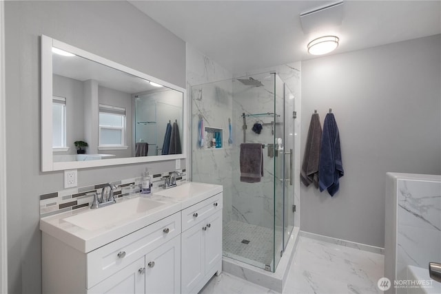 5036 Chambers Creek Loop, Olympia, WA 98501 - full bathroom with marble look tiles, a marble finish shower, baseboards, and double vanity