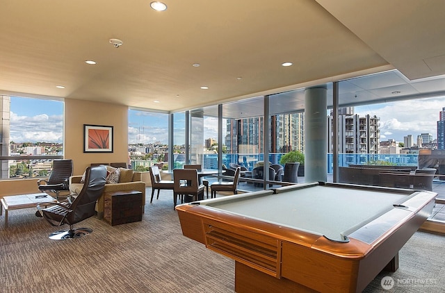 737 Olive Way Unit 2703, Seattle, WA 98101 - recreation room featuring a city view, recessed lighting, billiards table, healthy amount of natural light, and carpet flooring