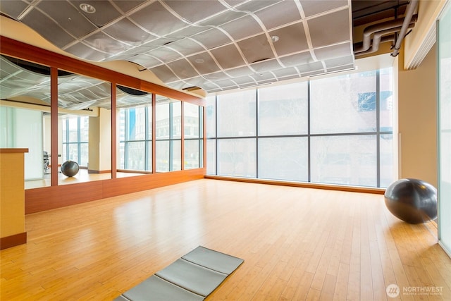737 Olive Way Unit 2703, Seattle, WA 98101 - workout room with wood-type flooring