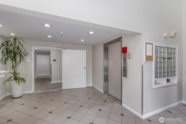 8260 53rd Ave W Unit 208, Mukilteo, WA 98275 - empty room featuring recessed lighting, elevator, mail area, and baseboards