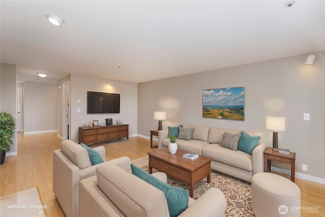 8260 53rd Ave W Unit 208, Mukilteo, WA 98275 - living area featuring light wood-type flooring and baseboards