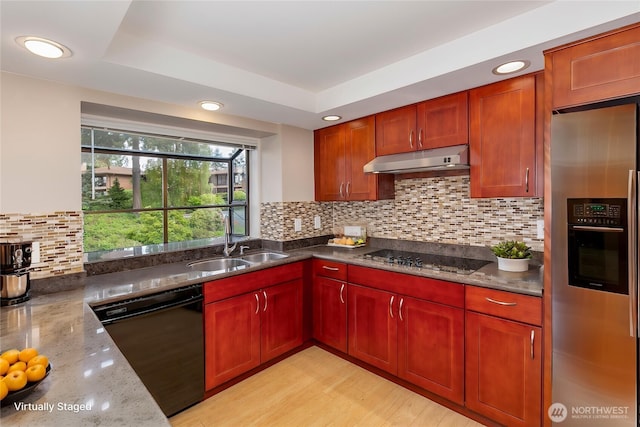 8260 53rd Ave W Unit 208, Mukilteo, WA 98275 - kitchen featuring black appliances, under cabinet range hood, dark stone counters, tasteful backsplash, and dark brown cabinets
