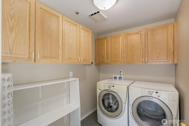 8260 53rd Ave W Unit 208, Mukilteo, WA 98275 - clothes washing area with independent washer and dryer, cabinet space, and baseboards