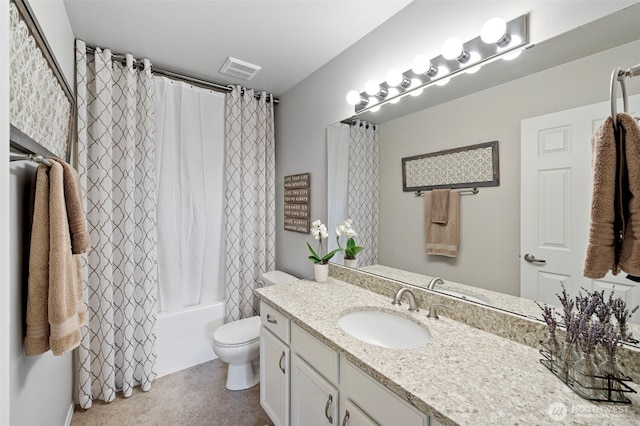 bathroom featuring toilet, vanity, and shower / tub combo