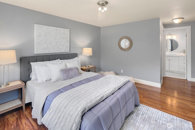610 Aloha St Unit 303, Seattle, WA 98109 - bedroom featuring wood finished floors and baseboards