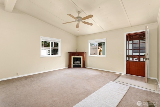 8322 19th Ave Court E Unit 11, Tacoma, WA 98404 - unfurnished living room featuring carpet, a ceiling fan, a fireplace, and baseboards