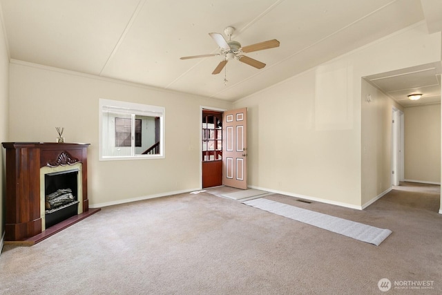8322 19th Ave Court E Unit 11, Tacoma, WA 98404 - unfurnished living room featuring carpet flooring, ceiling fan, baseboards, vaulted ceiling, and attic access
