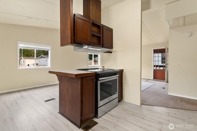 8322 19th Ave Court E Unit 11, Tacoma, WA 98404 - kitchen featuring stainless steel electric range oven, light wood-type flooring, open shelves, baseboards, and light countertops