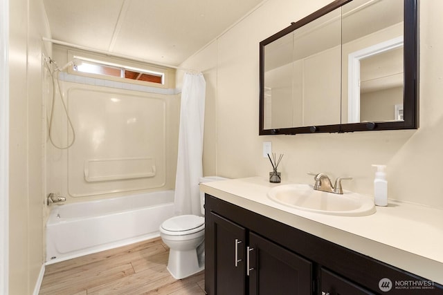 8322 19th Ave Court E Unit 11, Tacoma, WA 98404 - bathroom with toilet, wood finished floors, shower / bathtub combination with curtain, and vanity