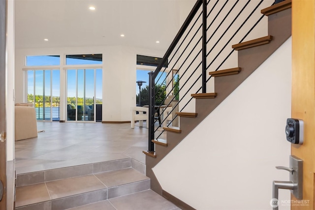 8553 NE Juanita Dr, Kirkland, WA 98034 - stairway featuring recessed lighting and tile patterned flooring