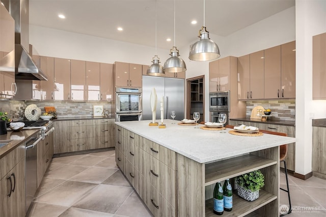 8553 NE Juanita Dr, Kirkland, WA 98034 - kitchen featuring built in appliances, open shelves, wall chimney range hood, a center island, and tasteful backsplash