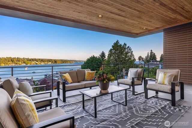 8553 NE Juanita Dr, Kirkland, WA 98034 - view of patio featuring an outdoor hangout area and a water view