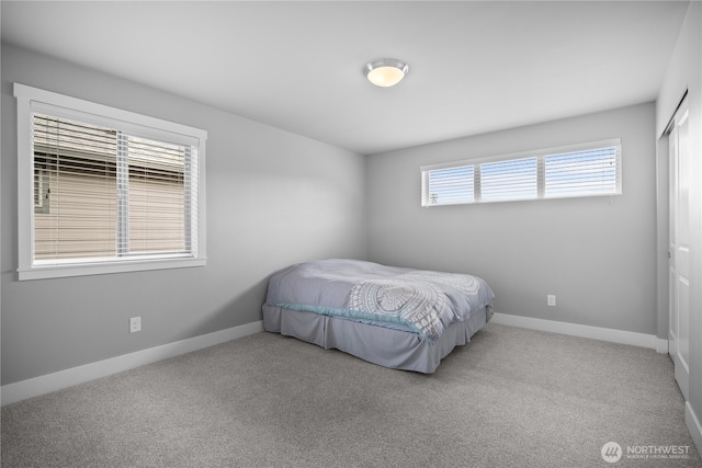 13127 184th Ave E, Bonney Lake, WA 98391 - carpeted bedroom featuring baseboards and a closet
