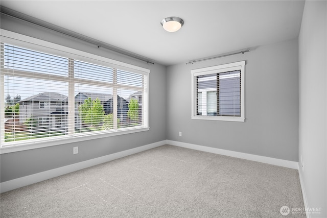 13127 184th Ave E, Bonney Lake, WA 98391 - carpeted empty room featuring baseboards