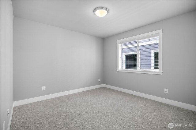 13127 184th Ave E, Bonney Lake, WA 98391 - empty room featuring carpet flooring and baseboards