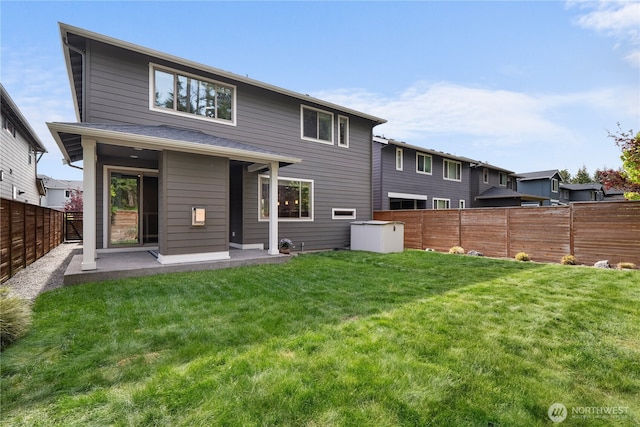 13127 184th Ave E, Bonney Lake, WA 98391 - rear view of house with a patio area
