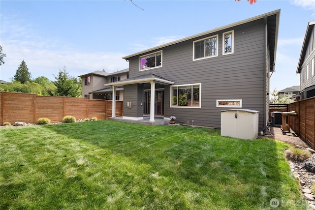 13127 184th Ave E, Bonney Lake, WA 98391 - back of house featuring a patio area and cooling unit