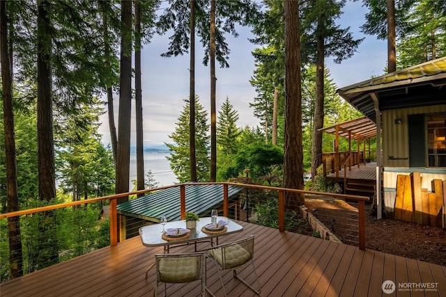 1059 Island Dr, Lummi Island, WA 98262 - wooden terrace with a water view and outdoor dining area