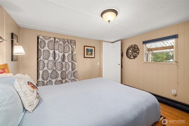 1059 Island Dr, Lummi Island, WA 98262 - bedroom featuring wood finished floors