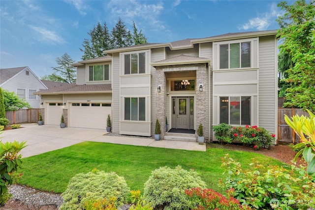 9827 NE 20th St, Bellevue, WA 98004 - prairie-style house with driveway, stone siding, and an attached garage