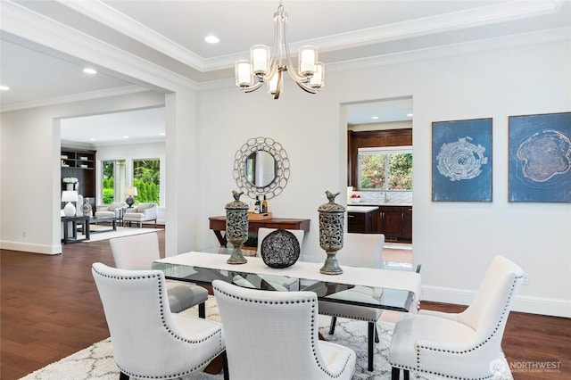 9827 NE 20th St, Bellevue, WA 98004 - dining room with a chandelier, dark wood finished floors, ornamental molding, baseboards, and recessed lighting