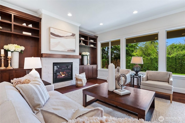 9827 NE 20th St, Bellevue, WA 98004 - living room featuring healthy amount of natural light, crown molding, wood finished floors, a glass covered fireplace, and recessed lighting