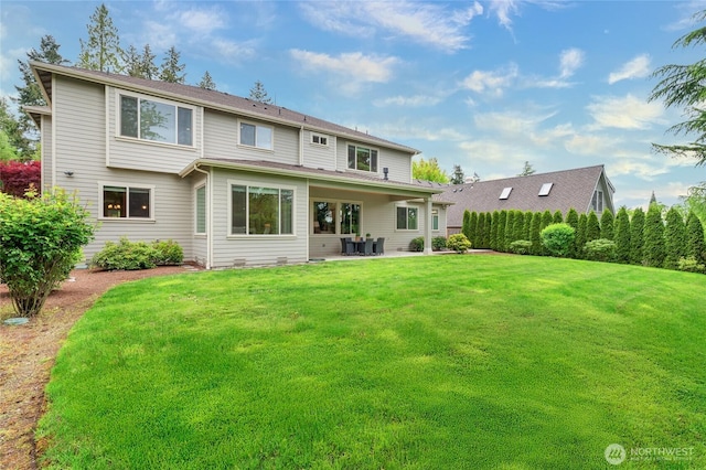 9827 NE 20th St, Bellevue, WA 98004 - back of property featuring a patio area and a lawn