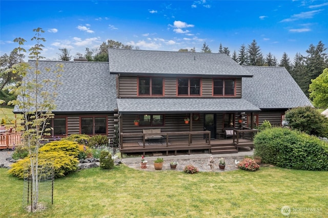5410 SW 244th St, Vashon, WA 98070 - rear view of property with a shingled roof, log siding, and a yard
