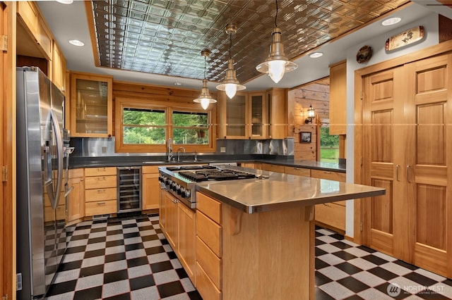 5410 SW 244th St, Vashon, WA 98070 - kitchen featuring stainless steel appliances, wine cooler, an ornate ceiling, dark flooring, and a sink