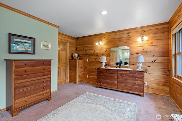 5410 SW 244th St, Vashon, WA 98070 - bedroom with light carpet, wood walls, ornamental molding, recessed lighting, and baseboards