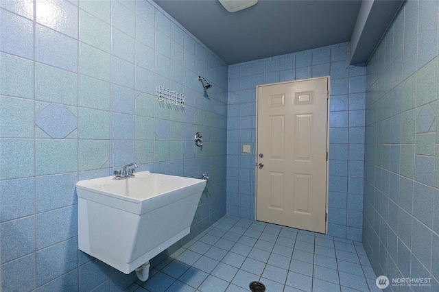 5410 SW 244th St, Vashon, WA 98070 - bathroom with tile walls, tile patterned floors, and a sink