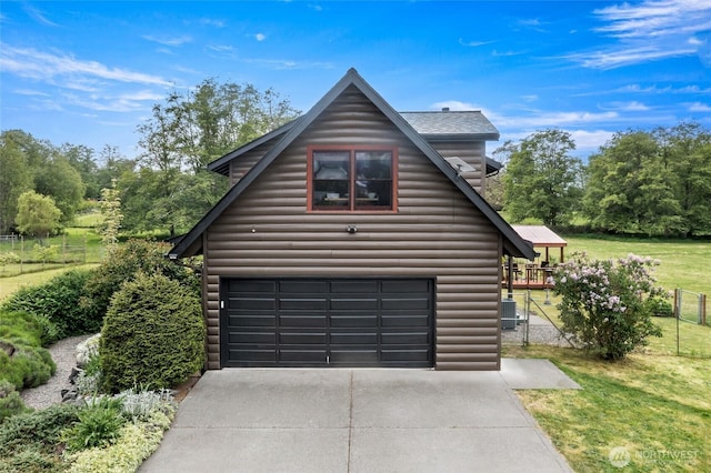 5410 SW 244th St, Vashon, WA 98070 - view of home's exterior with a garage and concrete driveway