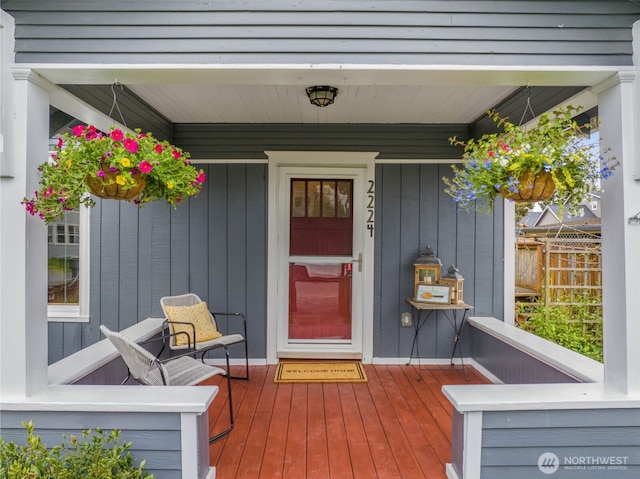 doorway to property with a porch