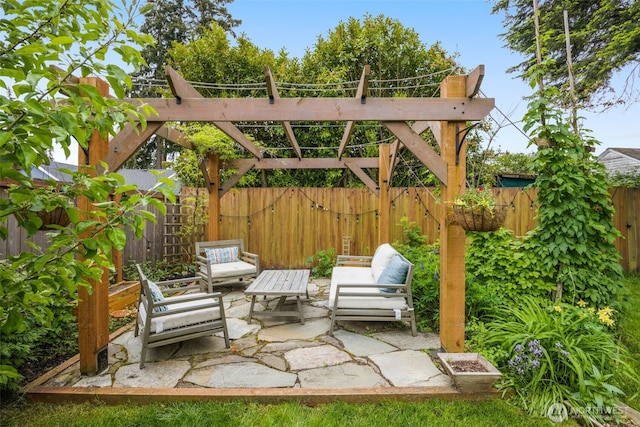 view of patio featuring a fenced backyard, an outdoor hangout area, and a pergola
