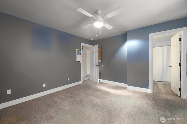 12128 167th Dr NE, Arlington, WA 98223 - unfurnished bedroom with baseboards, carpet floors, and ceiling fan