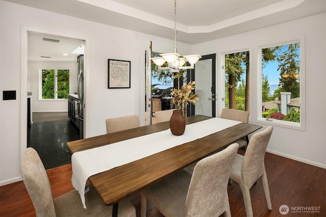 16910 73rd Pl W, Edmonds, WA 98026 - dining room featuring baseboards, dark wood-style flooring, and a chandelier