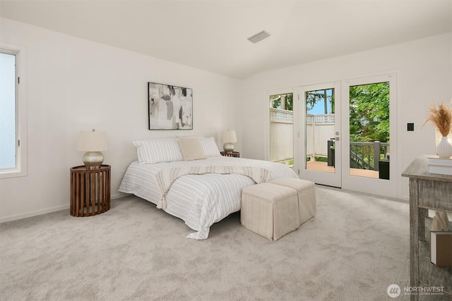 16910 73rd Pl W, Edmonds, WA 98026 - bedroom with access to exterior, carpet flooring, and baseboards