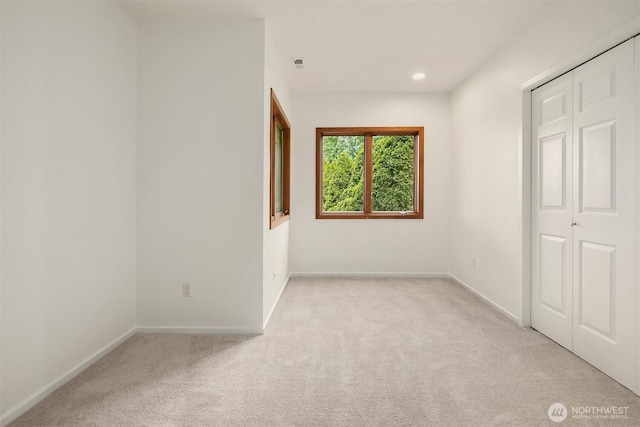 16910 73rd Pl W, Edmonds, WA 98026 - unfurnished bedroom featuring light carpet, baseboards, recessed lighting, and a closet