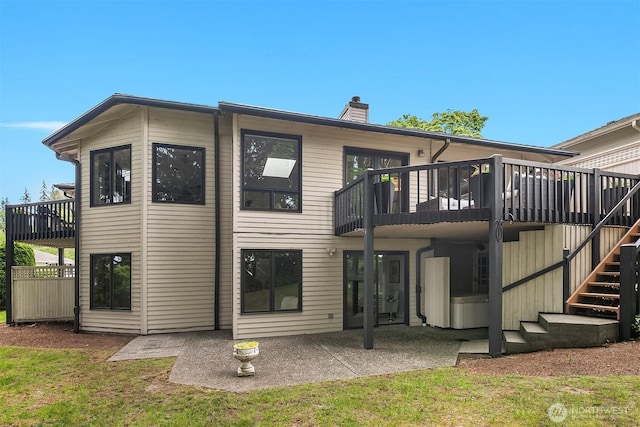 16910 73rd Pl W, Edmonds, WA 98026 - back of property featuring stairway, a chimney, a patio, and a balcony