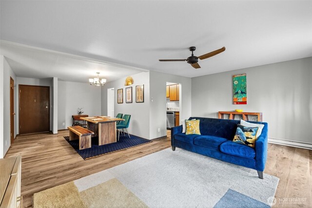 8516 196th St SW Unit 311, Edmonds, WA 98026 - living area with a chandelier, light wood-style flooring, baseboard heating, and ceiling fan