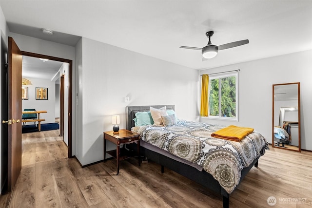 8516 196th St SW Unit 311, Edmonds, WA 98026 - bedroom with wood finished floors and a ceiling fan