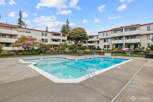 8516 196th St SW Unit 311, Edmonds, WA 98026 - community pool featuring fence, a patio, and a residential view