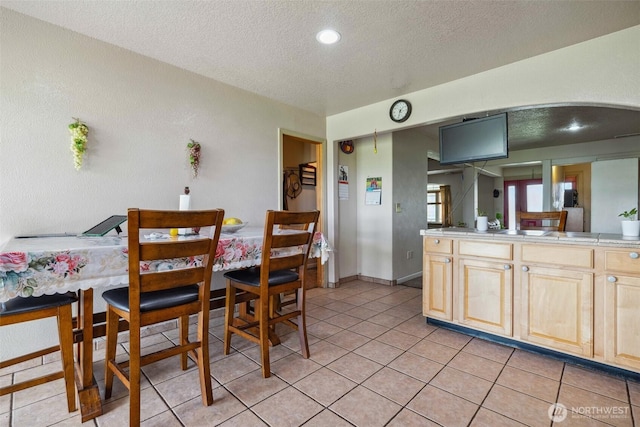 237 Reeds Rd, Touchet, WA 99360 - dining area featuring a textured ceiling, light tile patterned floors, and recessed lighting