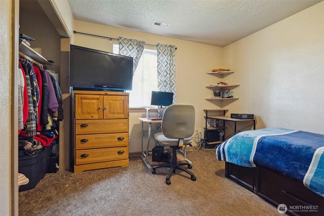 237 Reeds Rd, Touchet, WA 99360 - carpeted bedroom with a textured ceiling