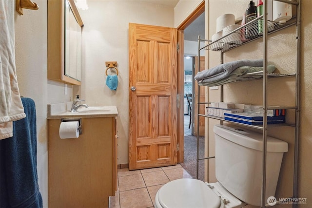 237 Reeds Rd, Touchet, WA 99360 - half bath with toilet, vanity, and tile patterned flooring