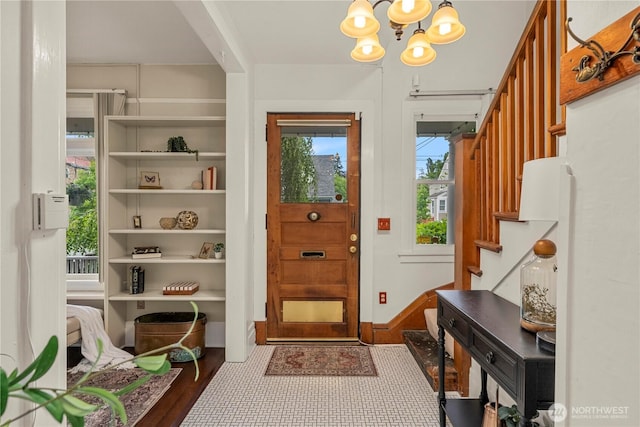 803 N 2nd St, Tacoma, WA 98403 - foyer with stairs, a chandelier, and wood finished floors