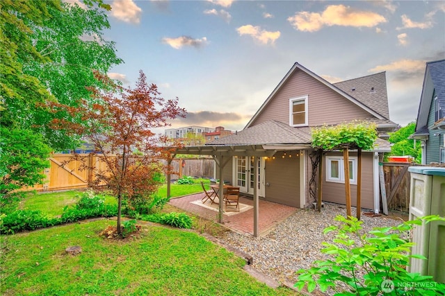 803 N 2nd St, Tacoma, WA 98403 - back of house featuring a patio and roof with shingles