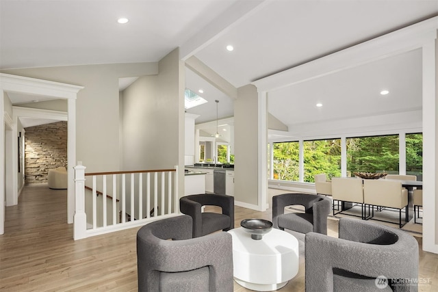13050 SE 21st Pl, Bellevue, WA 98005 - living area featuring plenty of natural light, an upstairs landing, light wood-style floors, recessed lighting, and baseboards